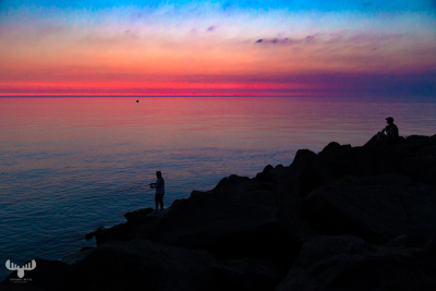 10236 - Fishermen at Hvide Sande pier at sunset