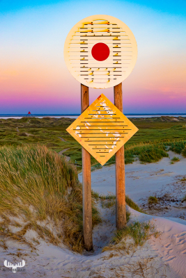 10332 - Sea mark in colorful sunset at Haurvig North Sea