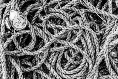 10689 - Ropes and beer can at Nr.Lyngvig Havn in B/W