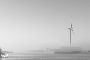 11170 - Hvide Sande Havn - harbor in B/W, fog and wind turbine