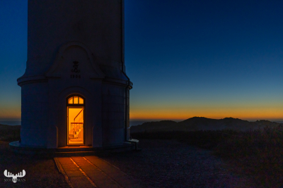 11227 - Nr.Lyngvig Fyr lighthouse at night with lights
