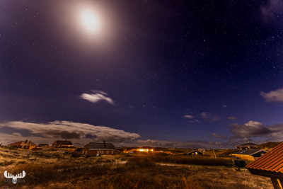 11284 - Starry night sky with moon with summer cottages