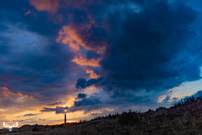 11393 - Nr.Lyngvig Fyr lighthouse with dramatic cloud bow at sunset