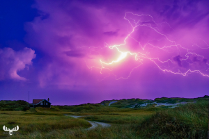 11475 - Lighting over summer cottages and dunes