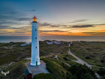 11565 - Nr.Lyngvig Fyr lit at sunset, North Sea and dunes