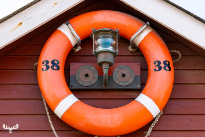 12038 - Lifebuoy on red fisherman's hut