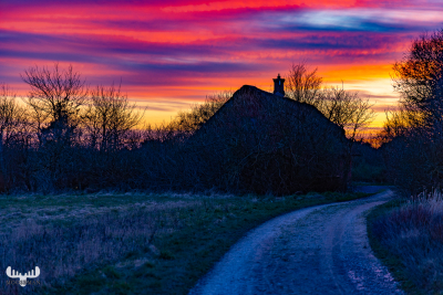 12044 - House in colorful sunset sky