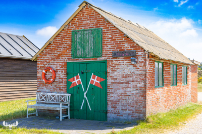 12146 -  - Helm Klink havn harbor -  Sea rescue boat house with Dannebrog flags