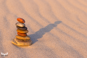 12216 -  - Pebble tower on sand structures with shadow III