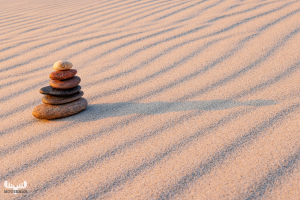 12221 -  - Pebble tower on sand structures with shadow II
