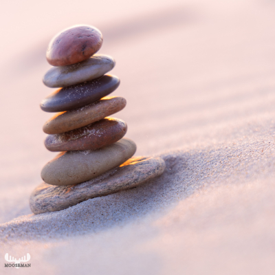 12226 - Pebble tower on sandy beach