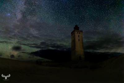 12578 - Rubjerg Knude Fyr lighthouse at night with starry sky and milky way