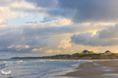 125986 -  - House on cliffs and wide Løkken beach at sunrise