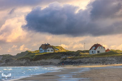 12598 -  - Houses on cliffs over Løkken beach at sunrise