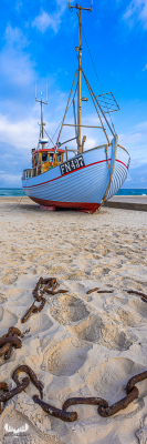 12608 - Fishing boat and chain at Løkken beach