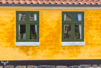 12631 - Løkken yellow house with green windows