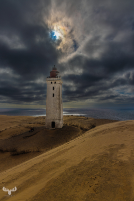 12658 - Rubjerg Knude Fyr ligthouse  - dramatic sky with opening for sun