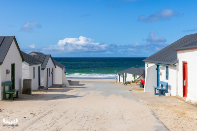 12745 - View through fsihing huts to North Sea at Stenbjerg Landingsplads
