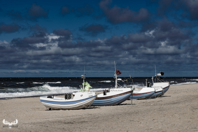12751 - Fishings boats with dramatic sky at Stenbjerg Landingsplads