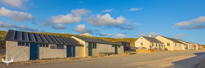 12778 - Fishing houses at Stenbjerg Landingsplads with warm light