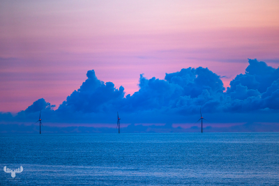 12802 - Offshore wind turbines in Nortsea, pastel colored sunset clouds