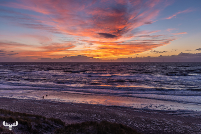 12820 - Sunset with person at North Sea