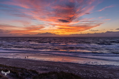 12820 - Sunset with person at North Sea