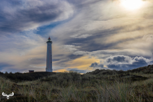 12824 - Nr.Lyngvig Fyr lighthouse with dramatic sky and clouds