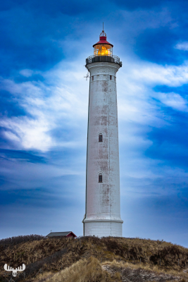 12891 - Nr.Lyngvig Fyr lighthouse with dramatic sky and clouds