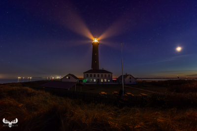 12995 - Det Grå Fyr lighthouse with blue sky and moon