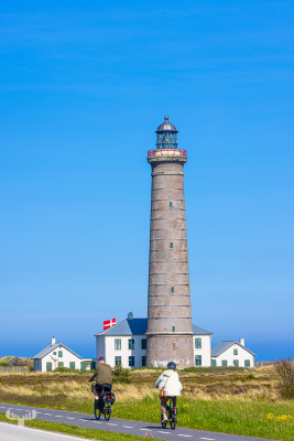 13007 - Det Grå Fyr lighthouse with cyclist