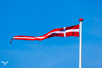 13047 - Dannebrog storm flag in blue sky
