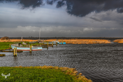13325 - Røklit Havn harbour with dark clouds