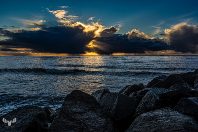 13548 - Hvide Sande pier at sunset with fishing boat and dramatic sky