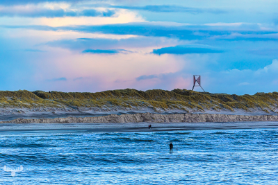13565 - Årgab Bake on dunes, surfer on Nirth Sea
