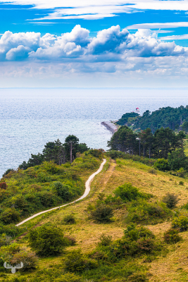 13786 - Sletterhage Fyr Lighthouse in distance with headland