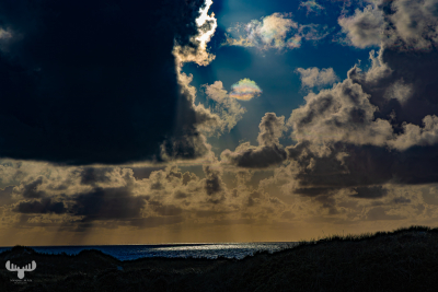 13914 - North Sea, dunes and iridescent clouds