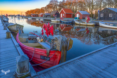 14133 - Frosty sunrise with fishing boats and huts at Stauning Havn harbour