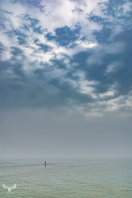 14408 - SUP on North Sea with cloudy sky