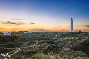 11566 - Nr.Lyngvig Fyr lit at sunset, dune landscape