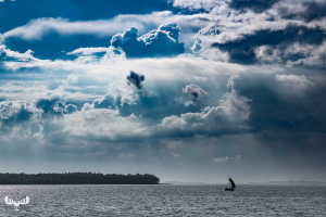 13822 - Ebeltoft Havn - Sea with sailing boat and dramatic clouds