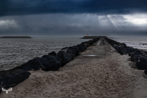 14305 - Dramatic light over Hvide Sande harbour pier