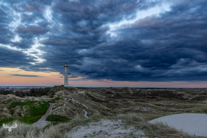 14464 - Nr.Lyngvig Fyr lighthouse  with dark sky at sunset