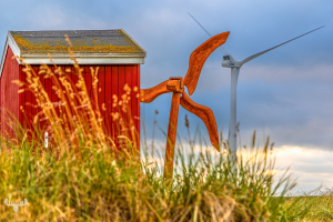 14513 - Red hut with wind turbines in Hvide Sande