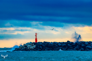 14532 - Hvide Sande Pier with red beacon and breakersa at sunset
