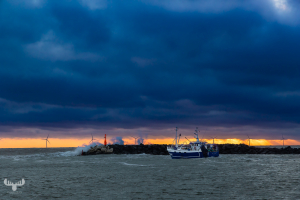 15453 - Hvide Sande Pier with breaker, beacon, fishing boat and dramatic sky