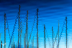 14581 - Sailing boat masts mirrored in water