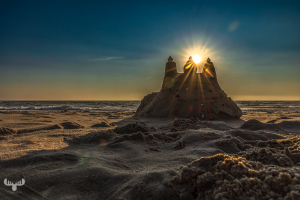 14623 - Sandcastle at North Sea beach at sunset