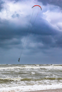 14648 - Kitesurfer on North Sea beach, flying